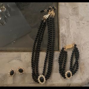 Three pc set.  Necklace bracelet and earrings